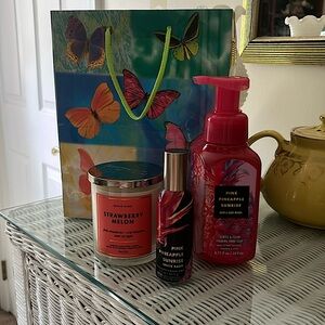 NWT set of Bath and Bodyworks “Pink” hand soap, room spray and candle